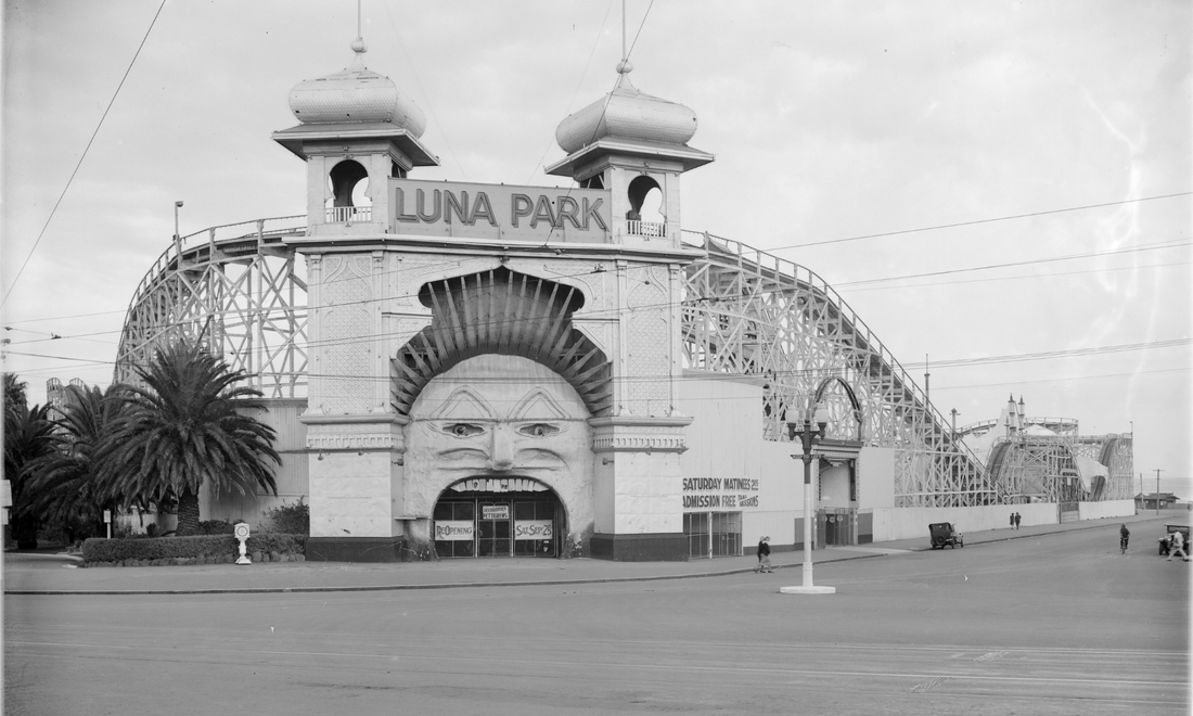 Luna Park Melbourne entrance during the 1940s historical photograph featuring the iconic amusement park facade and scenic railway.