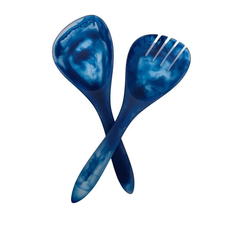 Blue marbled salad serving set with fork and spoon on white background