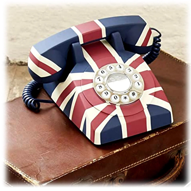 Vintage rotary phone with Union Jack design on brown leather suitcase