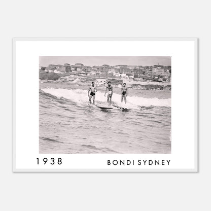 Black and white photo of three surfers in Bondi, Sydney with text '1938 Bondi Sydney'.