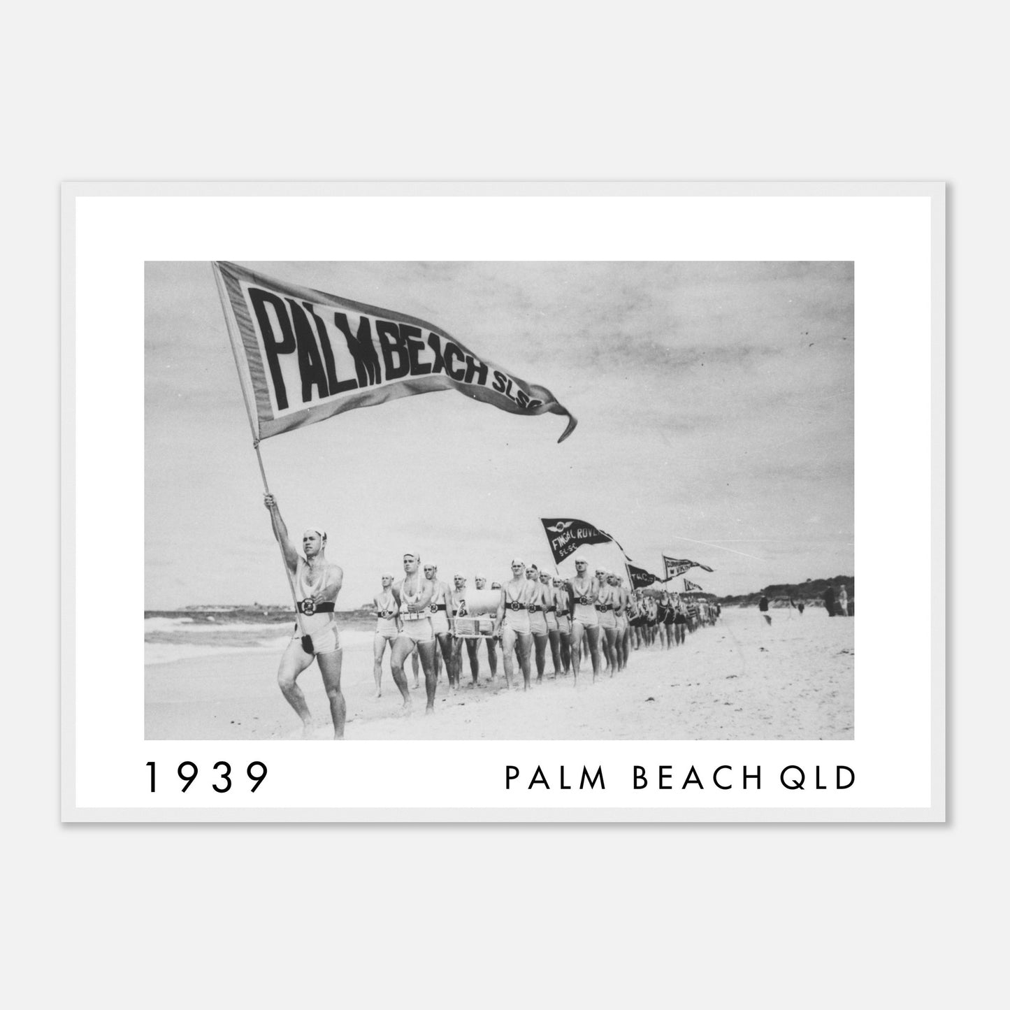 Palm Beach Queensland 1939 surf lifesaving carnival with competitors marching along the beach