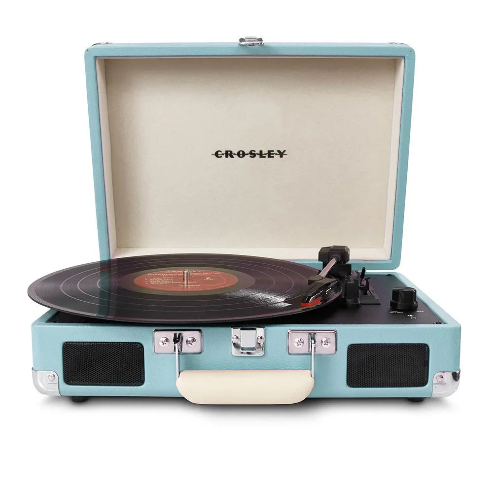 Blue Crosley portable record player with vinyl on turntable, open suitcase design