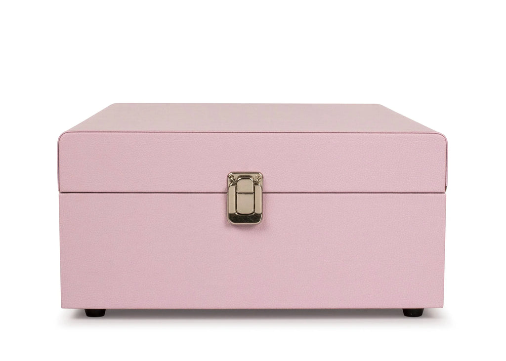 Pink leather jewelry box with silver clasp on white background