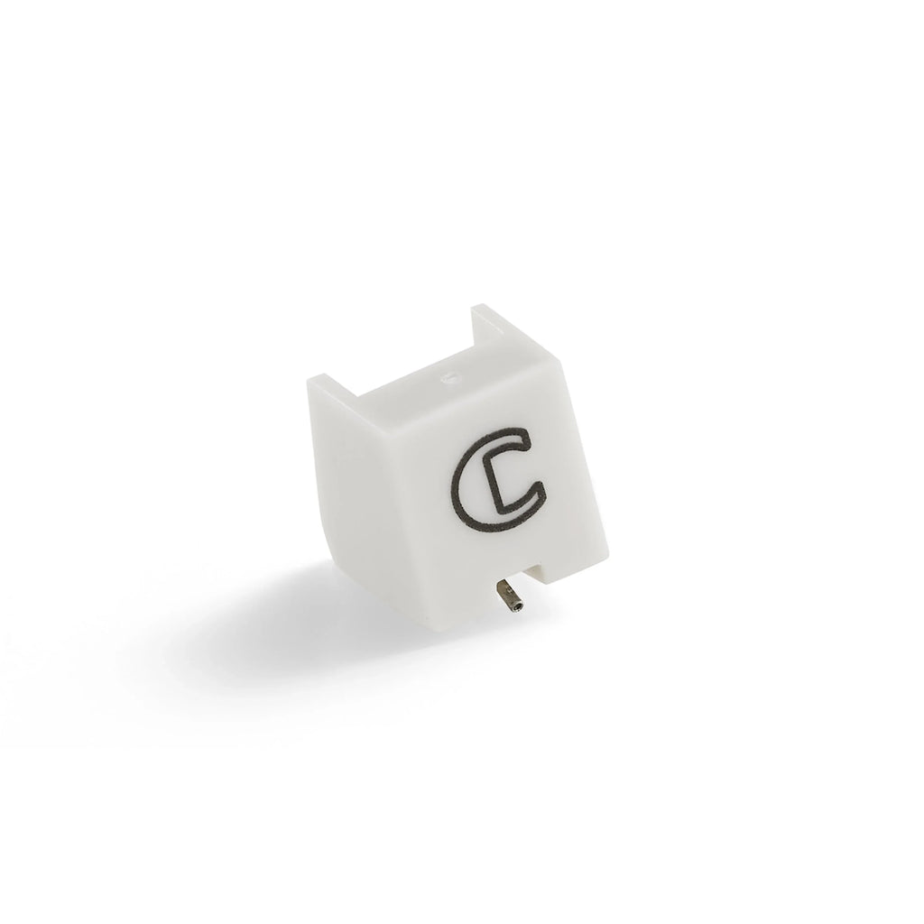 White mechanical keyboard keycap with black C letter on white background