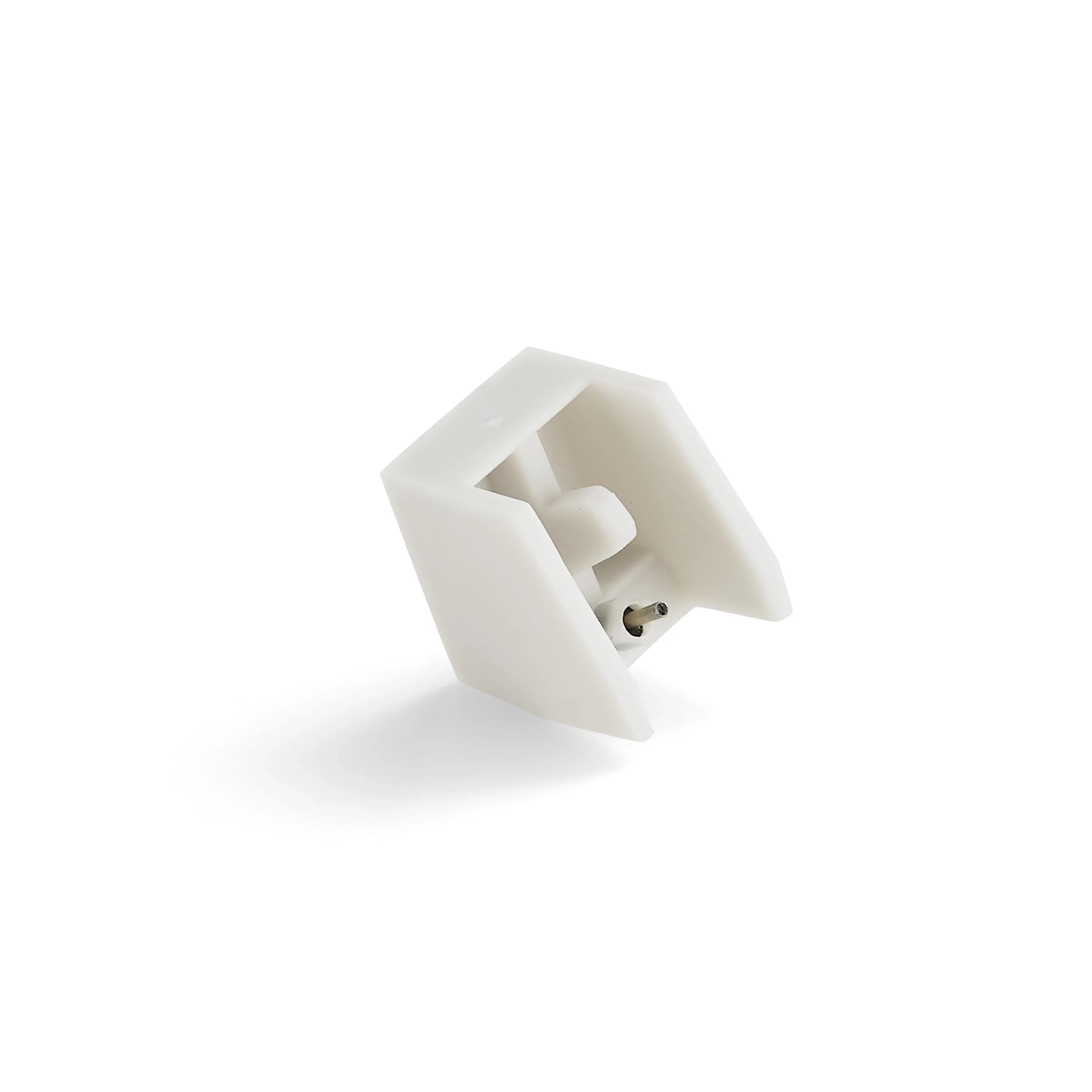 White replacement turntable stylus needle for record player on white background