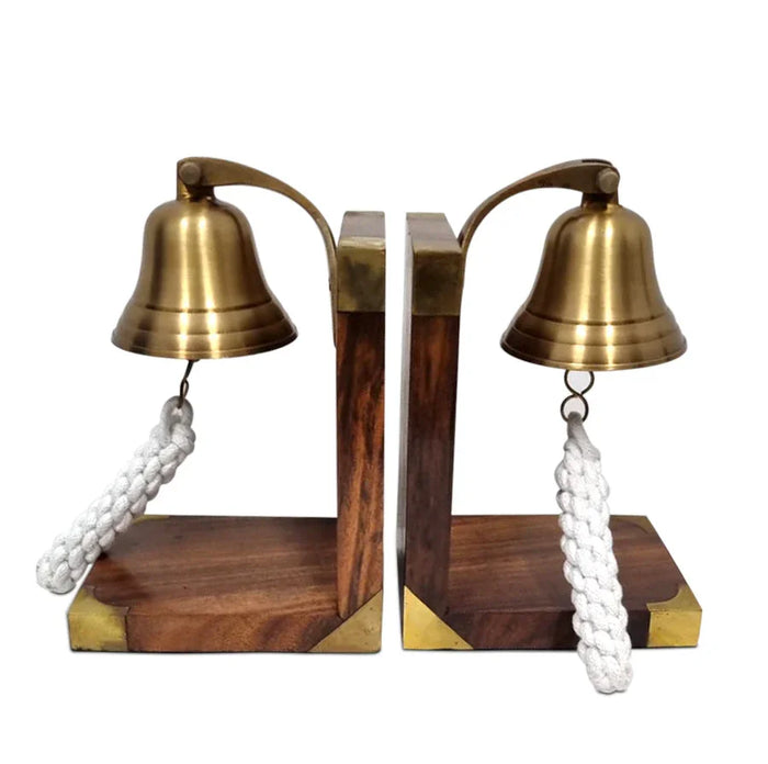 Pair of brass bell bookends with wooden bases and white rope pulls