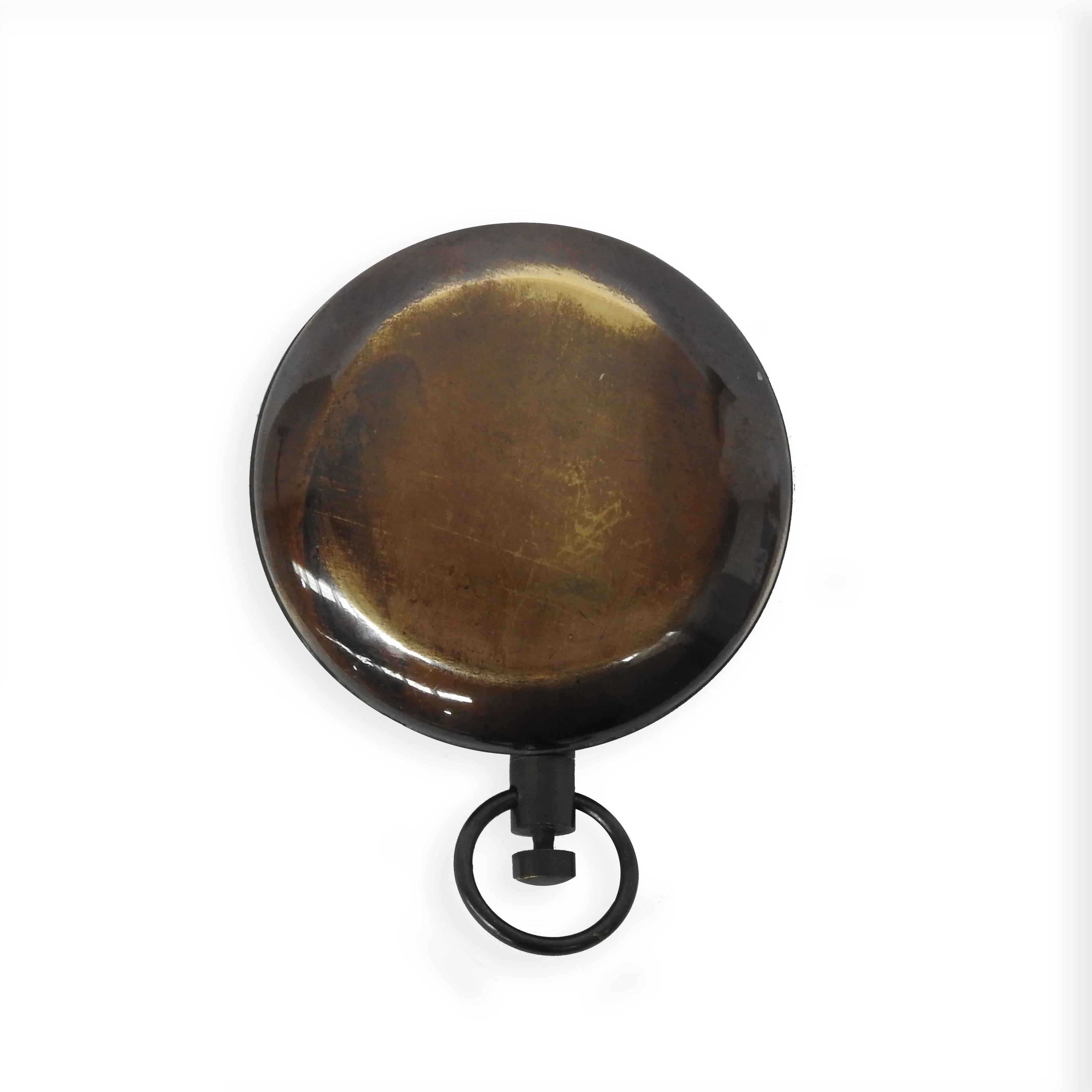 Vintage round brass retractable key holder with metal ring on white background