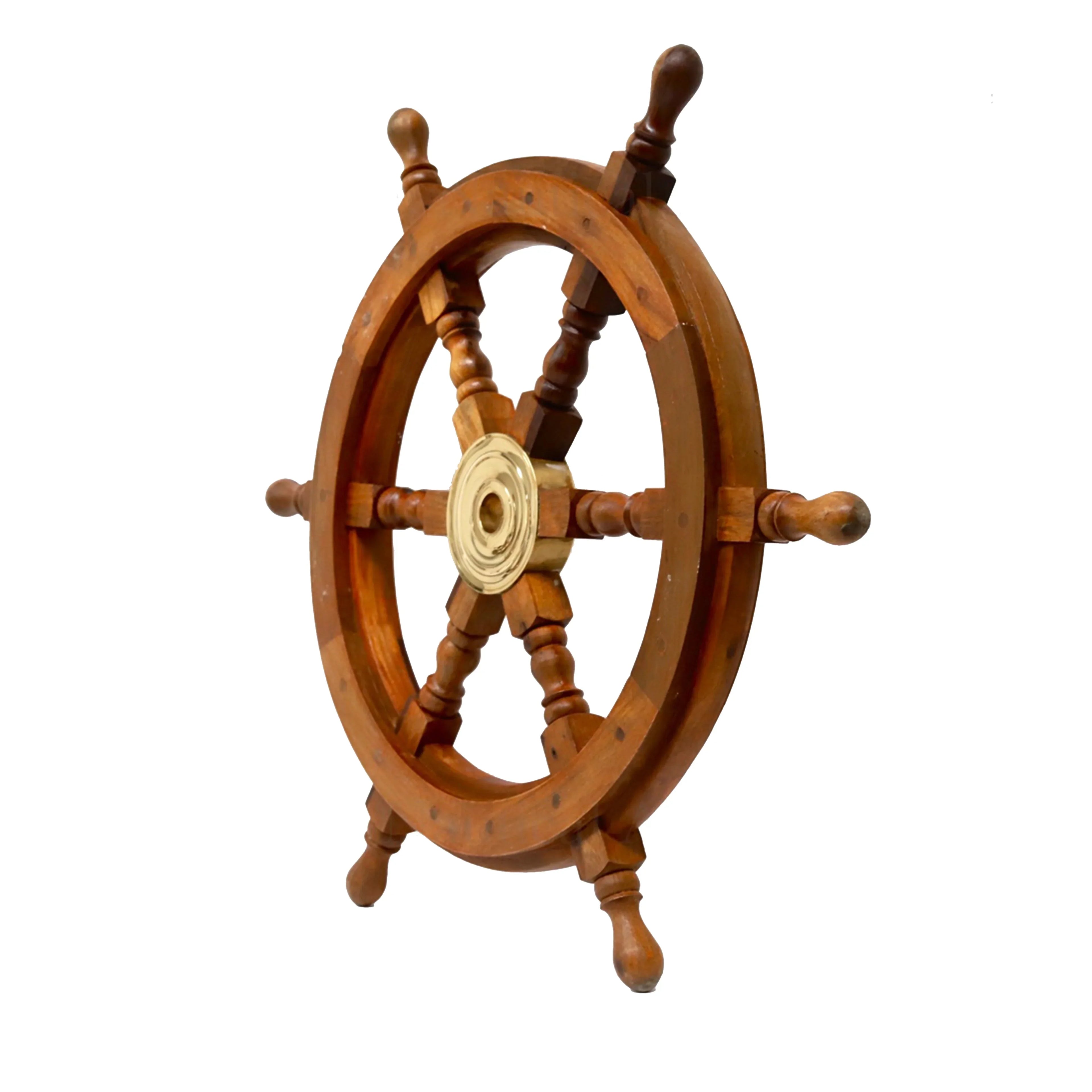 Wooden ship wheel with brass center, nautical decor on white background