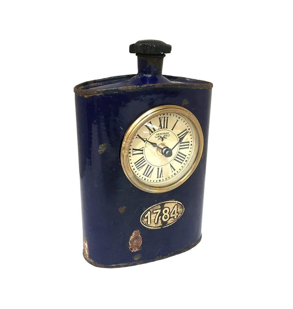 Vintage blue flask-shaped desk clock with '1784' plaque and Roman numerals