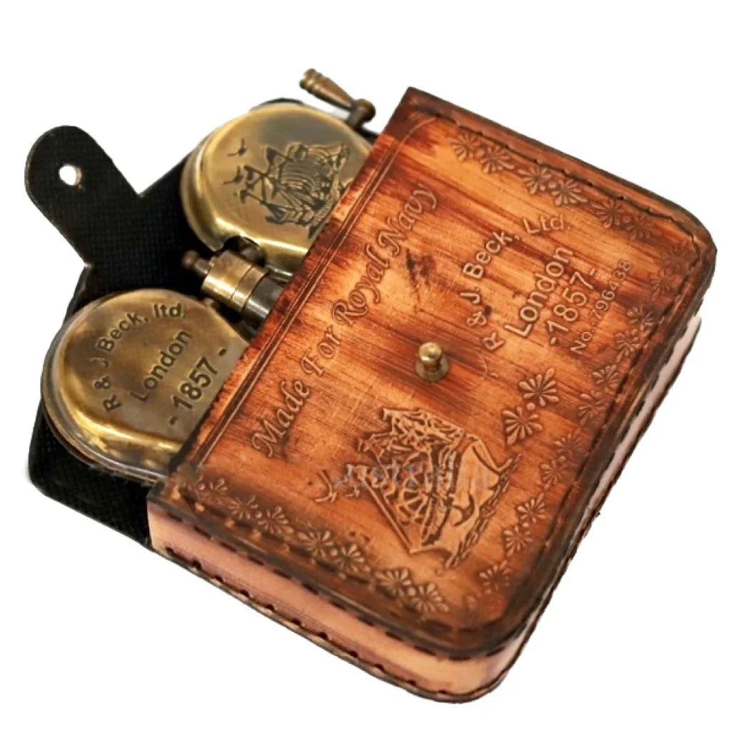 Antique brass compass and sundial set in engraved leather case marked for Royal Navy, 1857
