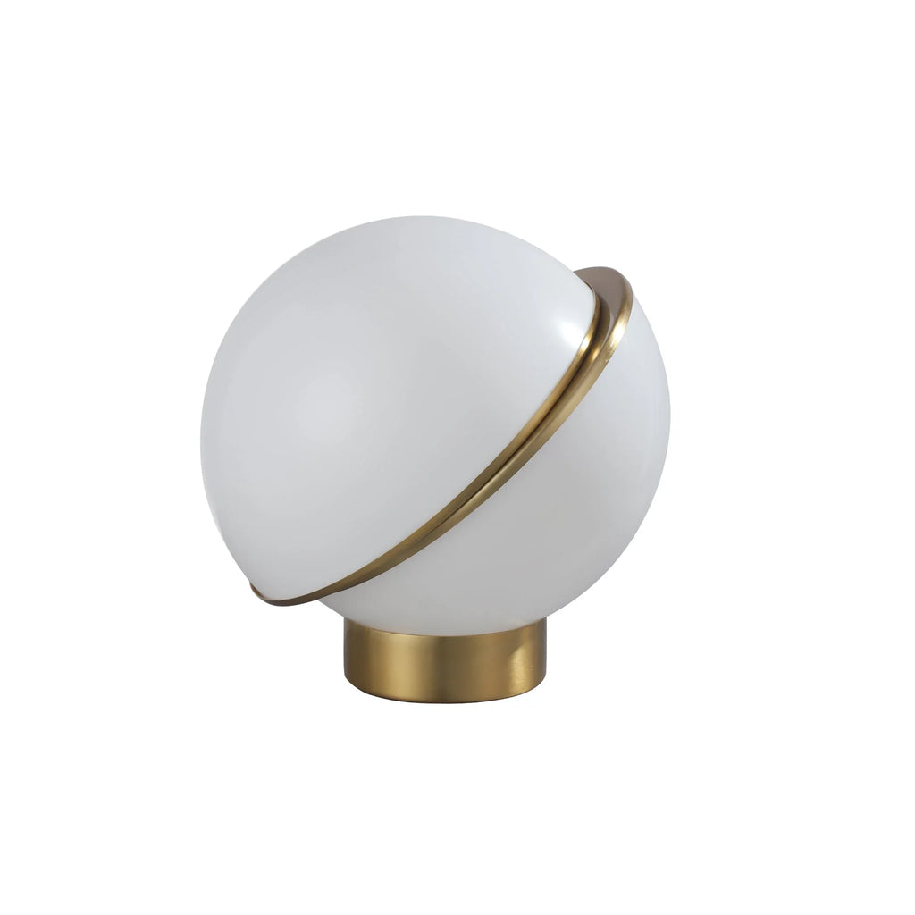 Modern brass and white globe table lamp with minimalist design on white background