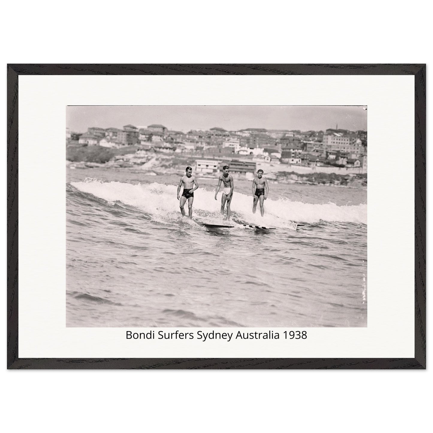 Black and white photo of surfers at Bondi Beach, Sydney, Australia in 1938.